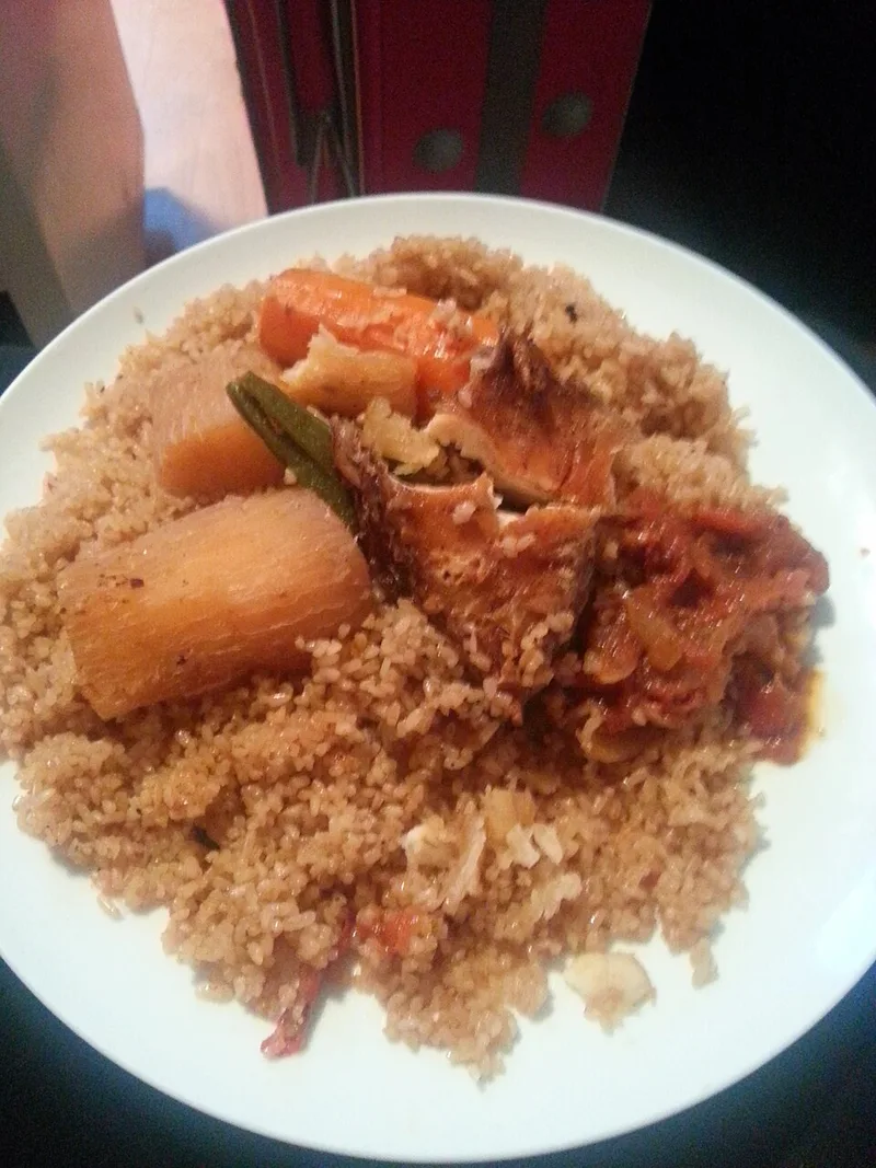 Yassa Poisson (Onion & Lime Fish), via Wikimedia Commons